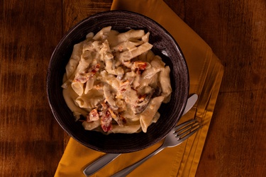 Garganelli con Prosciutto di Parma e Pomodori Secchi