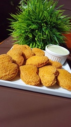 Porção Nuggets