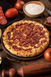 PIZZA MÉDIA MEIO A MEIO