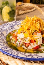 CEVICHE DE TILÁPIA PICANTE COM MANGA